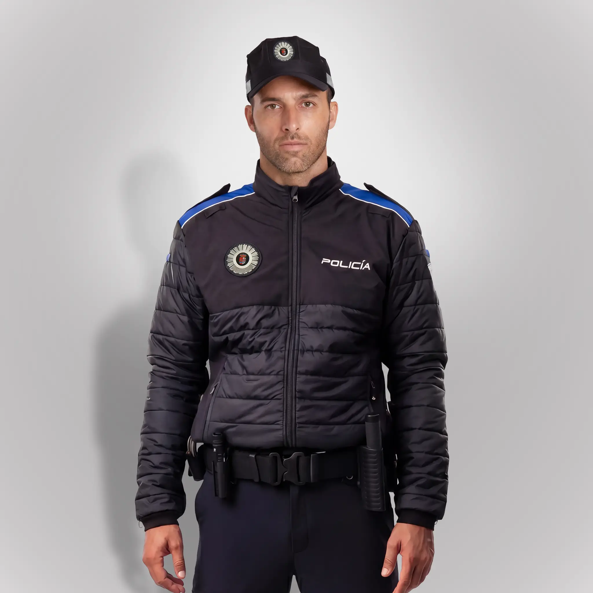 Agente de policía con cazadora térmica ligera acolchada azul noche y hombros en azul índigo de Comunidad de Madrid | Serie Origen | Satara